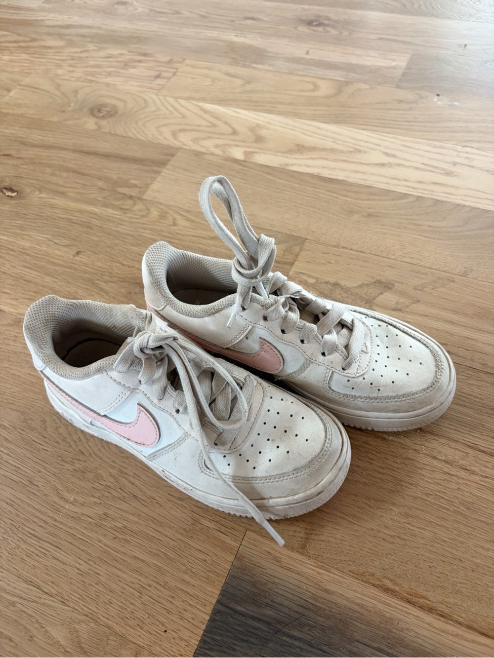 Nike Kids White Sneakers with Pink Swoosh